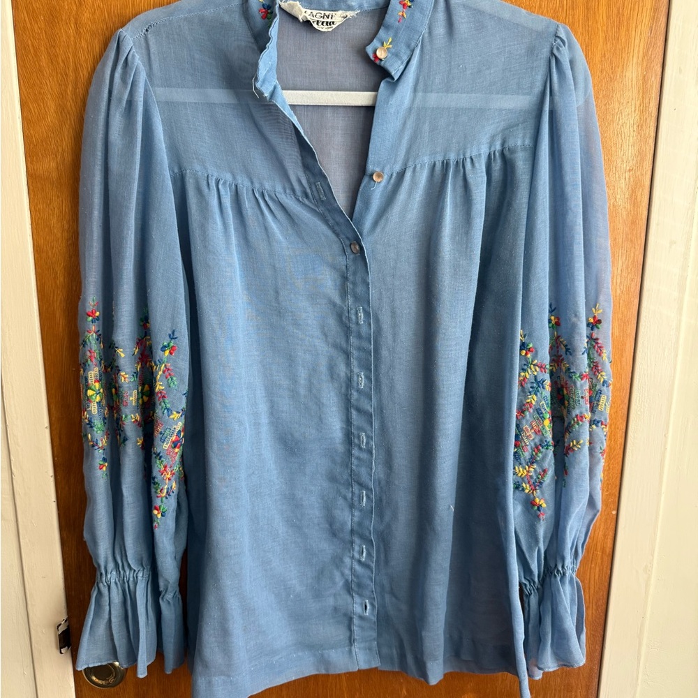 Elegant Blue Blouse with Floral Details
